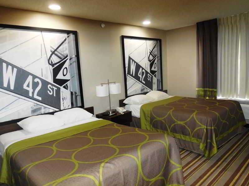 Super 8 By Wyndham Jamaica North Conduit Hotel New York Bagian luar foto