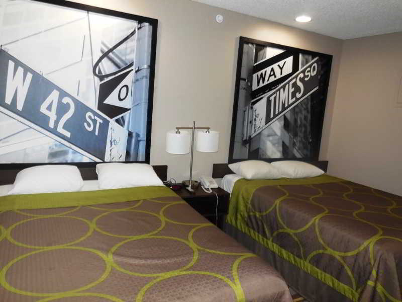 Super 8 By Wyndham Jamaica North Conduit Hotel New York Bagian luar foto